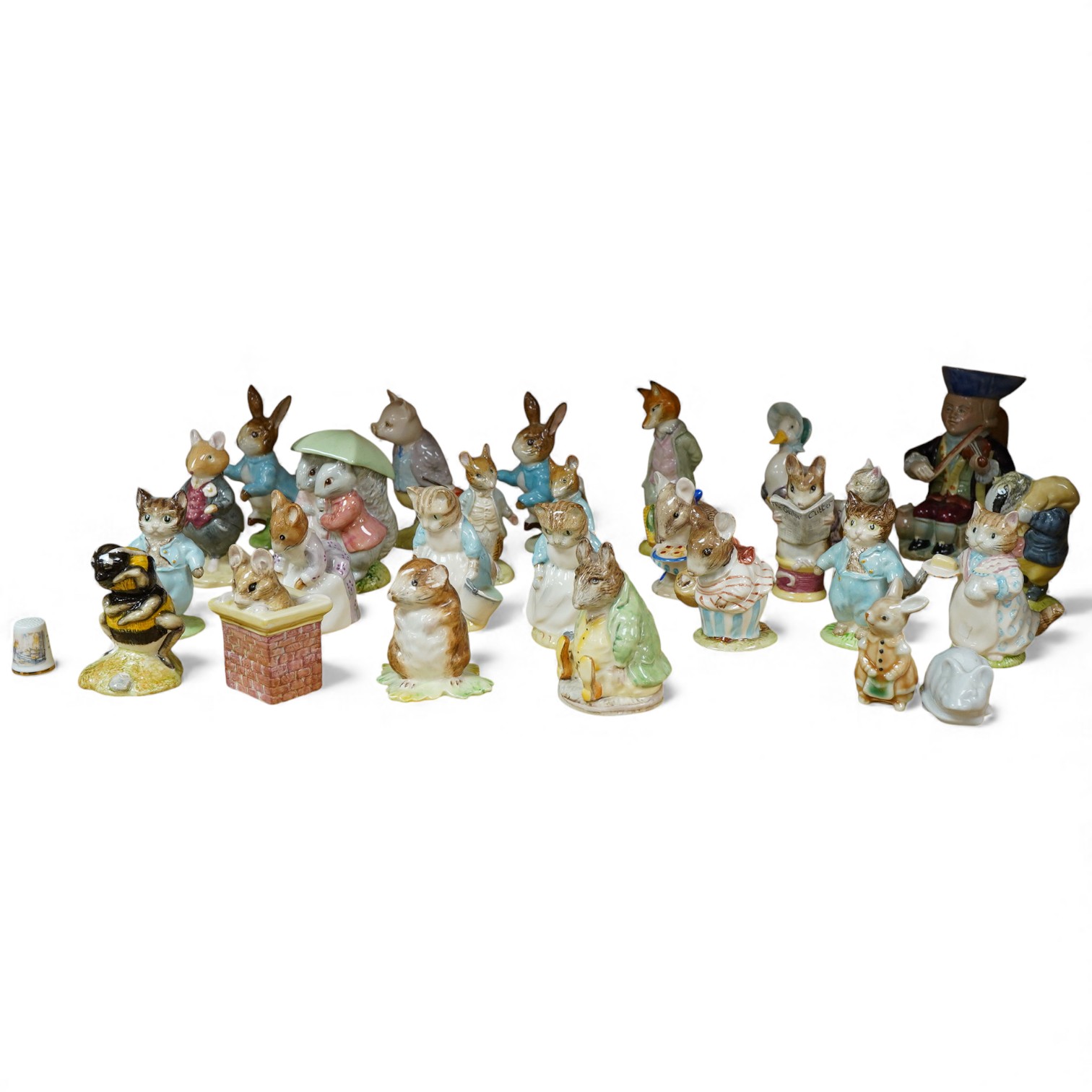 A collection of Beswick and Royal Albert Beatrix Potter figures and others, largest 13cm high